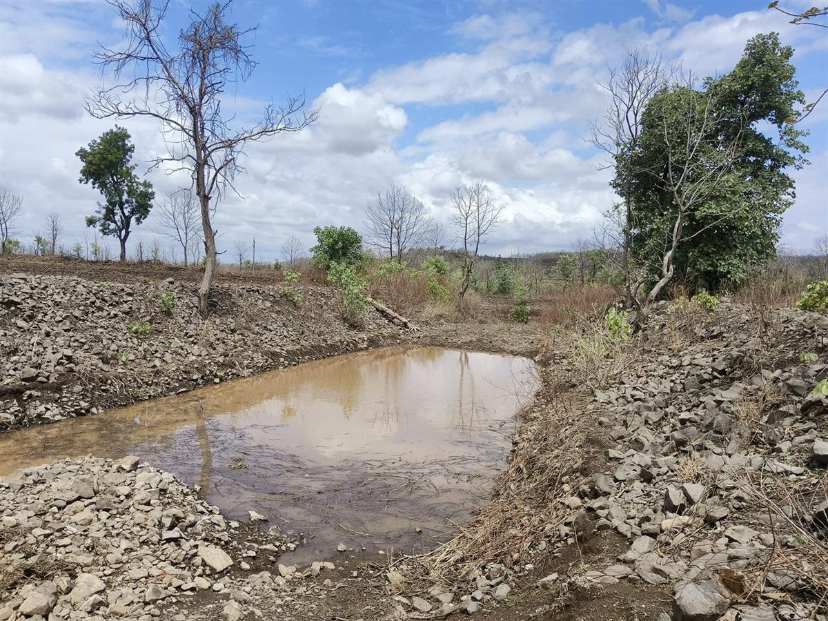 A water conservation structure holding monsoon runoff