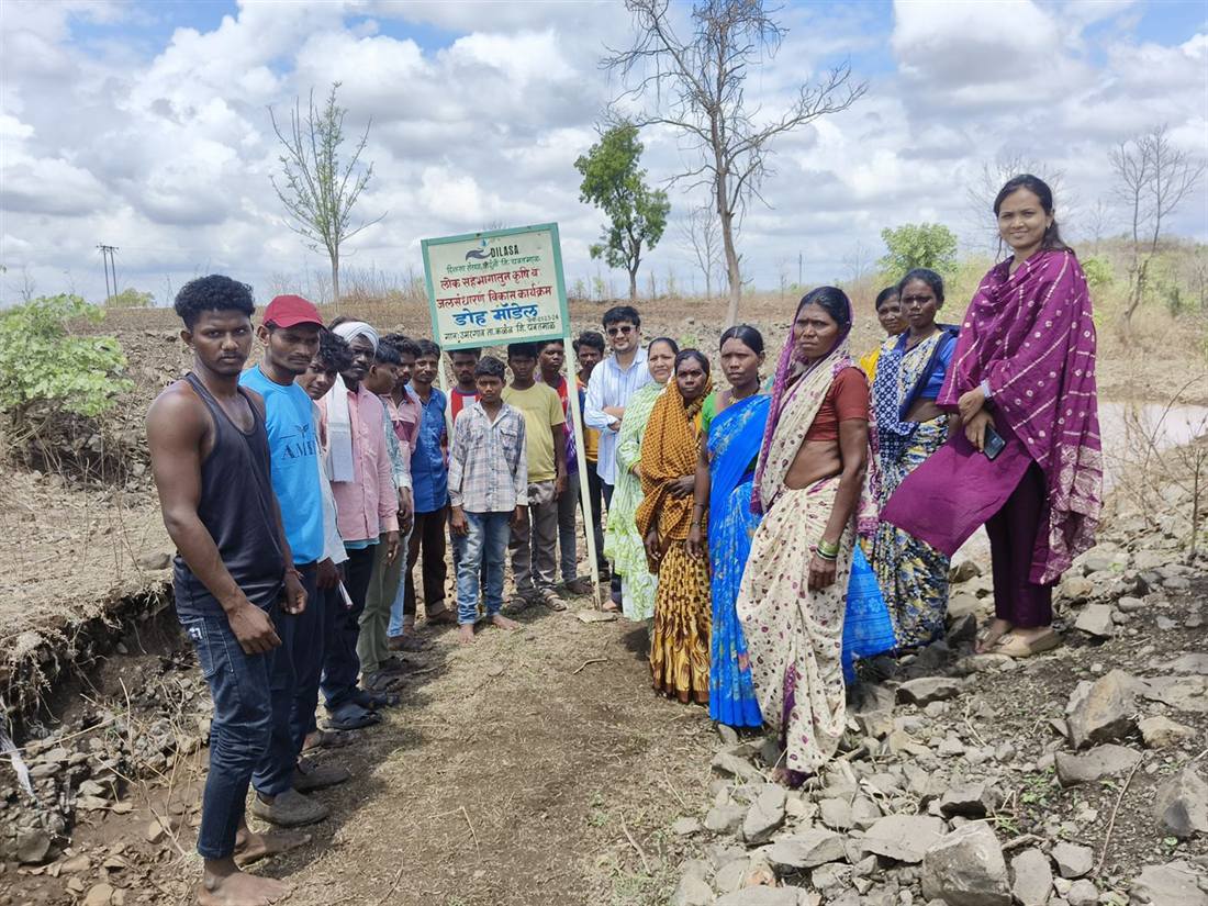 Villagers at a completed watershed site